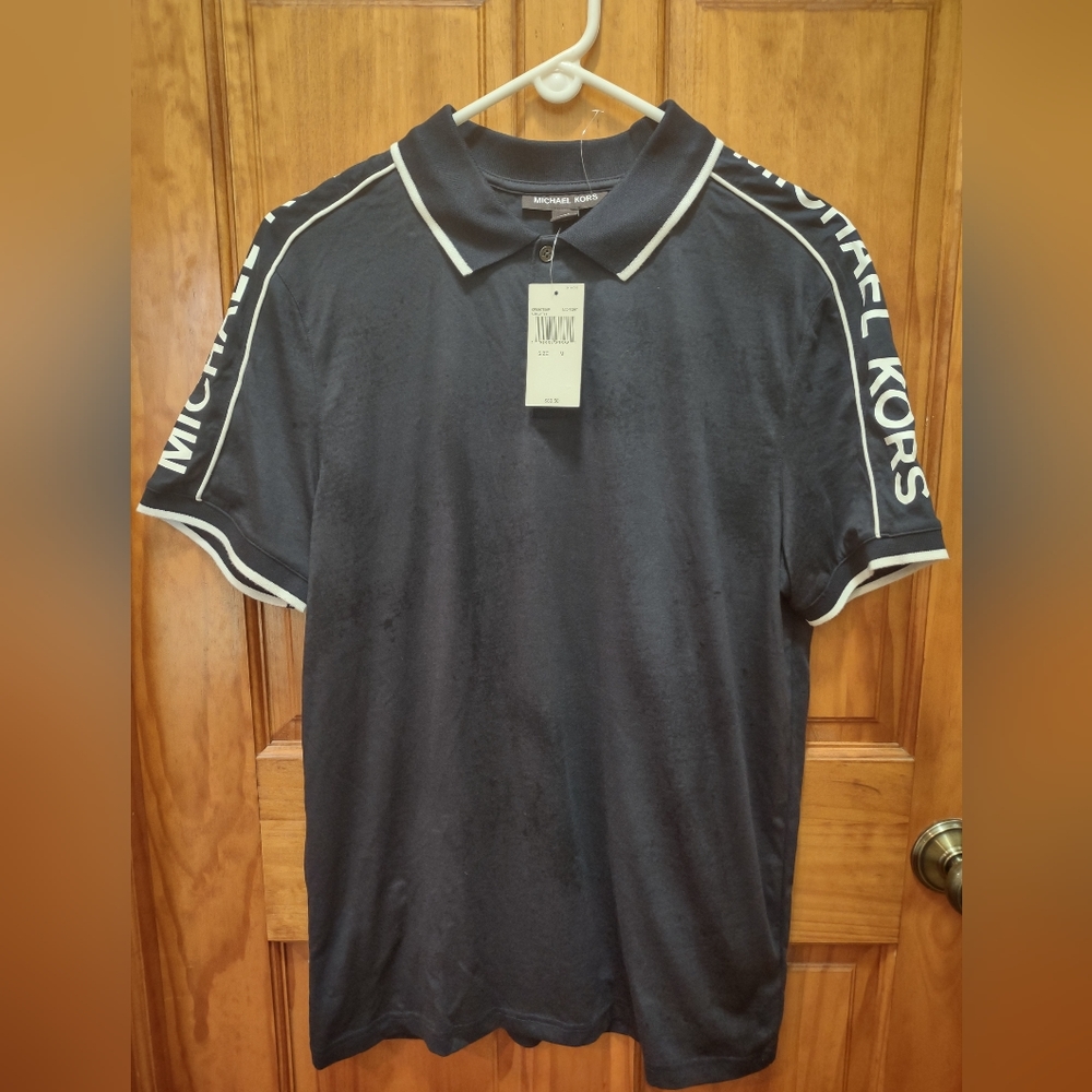 Michael Kors golf shirt.  Midnight blue. Size Men's Medium